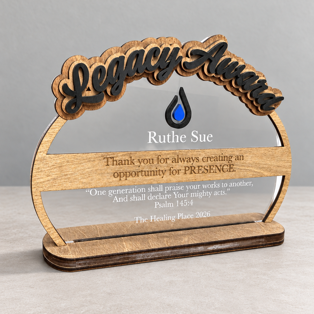 Clear acrylic Legacy Award with a layered wood title, logo, engraved name and verse, on a wood stand
