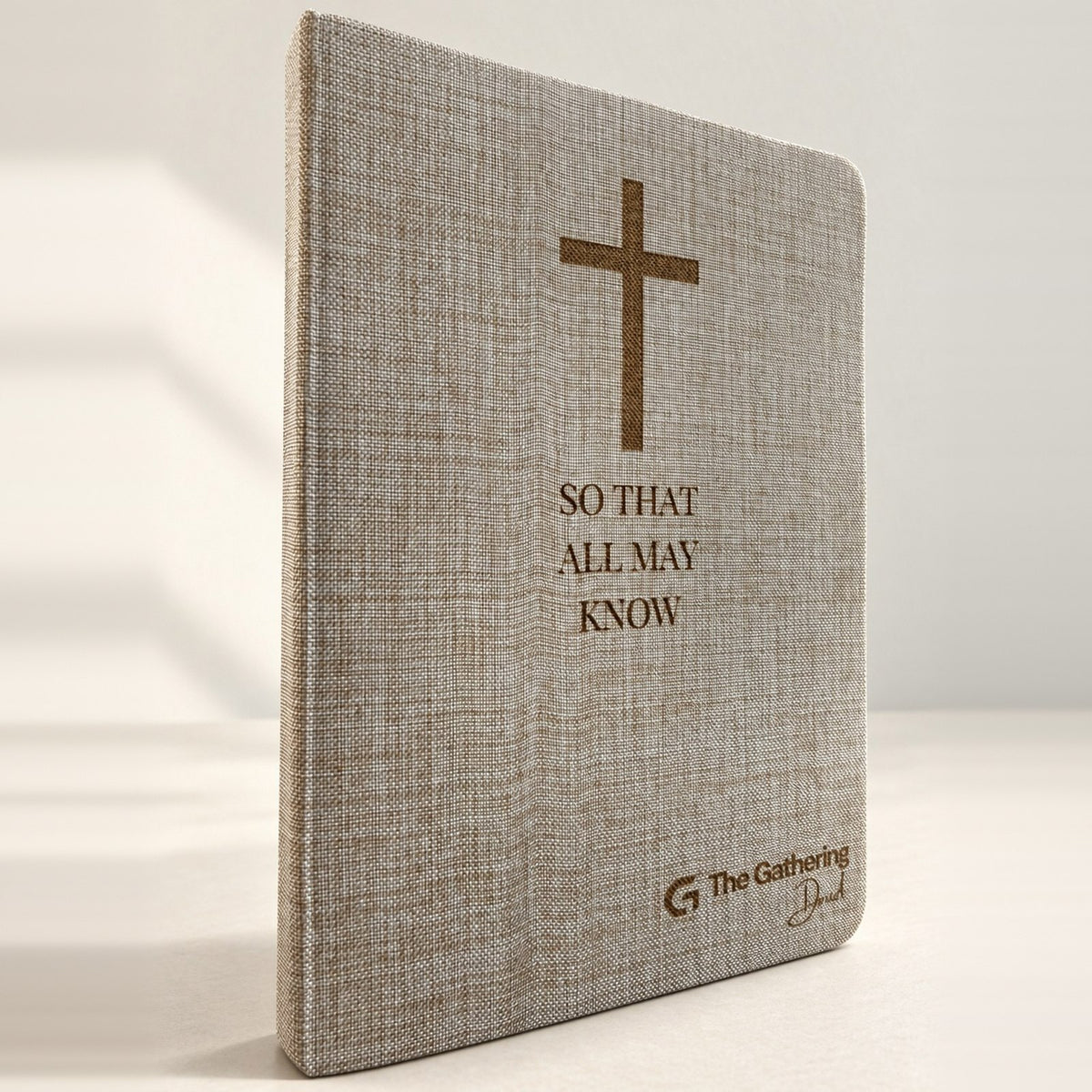 Linen-cover hardcover journal laser engraved with a cross, So That All May Know, and a church logo