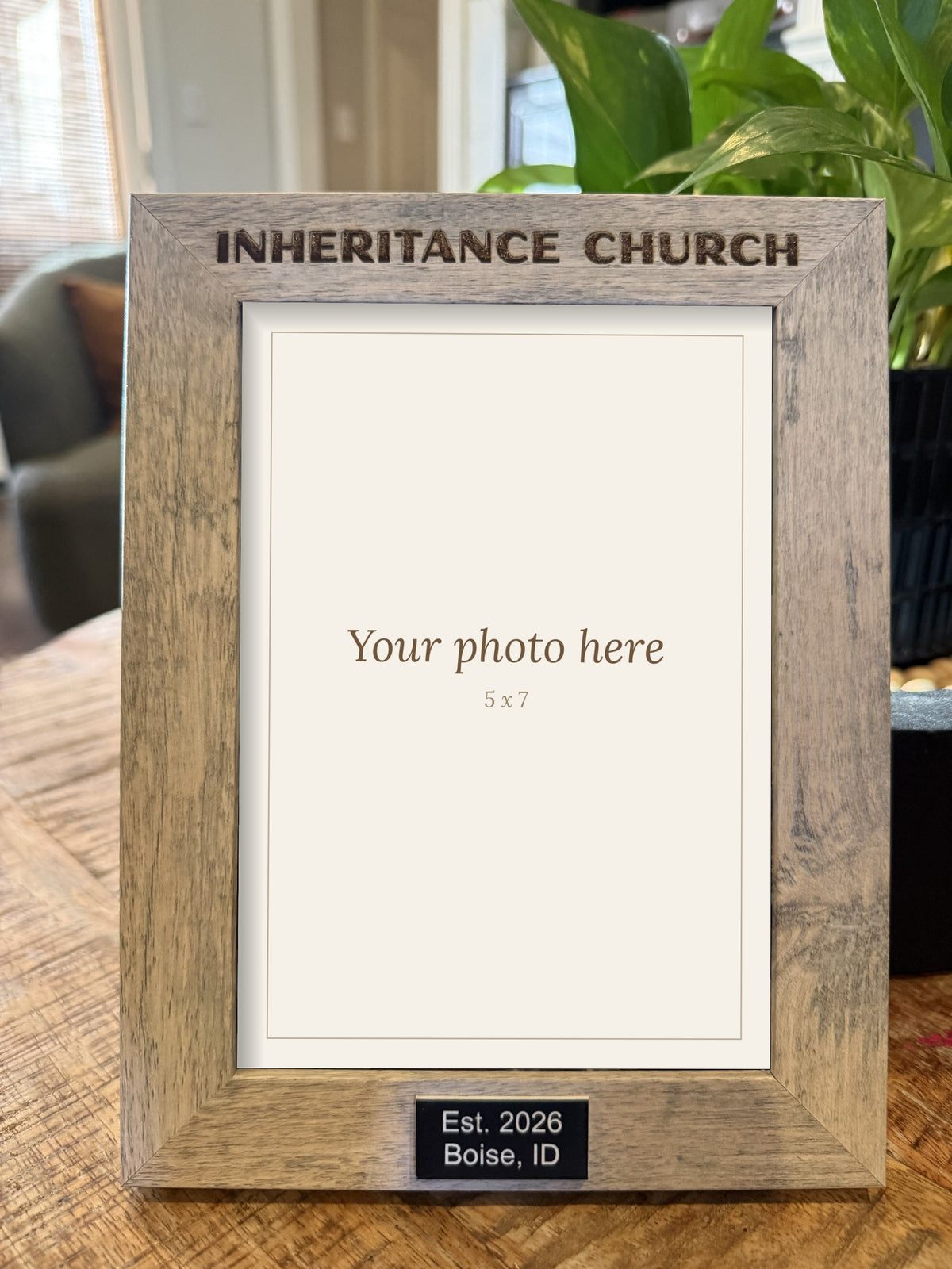 Custom engraved 5x7 gray wood-grain picture frame with a company name engraved on top and a black engraved plate on the bottom