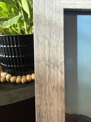Close-up of the rustic gray wood-grain finish on the 5x7 picture frame