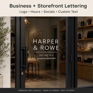 White vinyl business lettering on a storefront window
