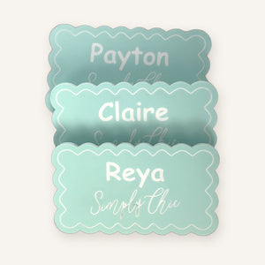 Set of three matching mint name badges for a team